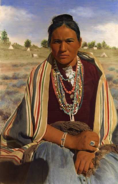Indian woman with striped blanket